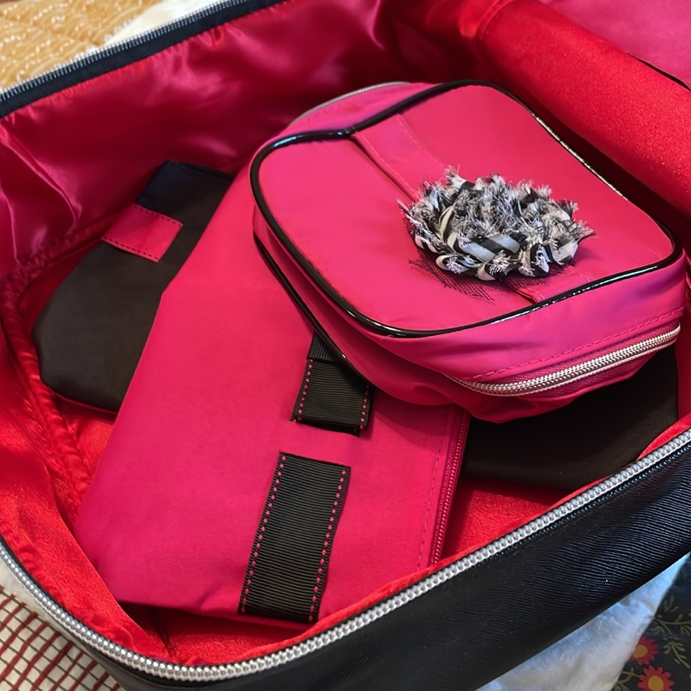Women’s Black 11” square zippered Train Case or Cosmetics Bag w/ red interior.